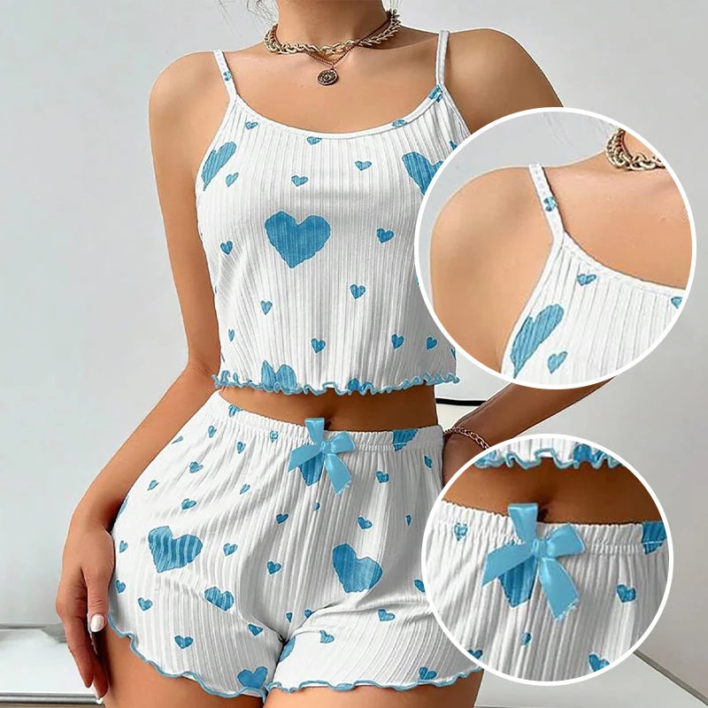 White and blue Women's Pajamas Set - Soft Pajama Set with heart print, close-up on bow detail and soft straps for added comfort.