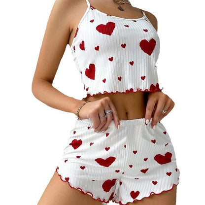 White Women's Pajamas Set - Soft Pajama Set with red hearts, featuring a sleeveless top and elastic shorts for cozy lounging.