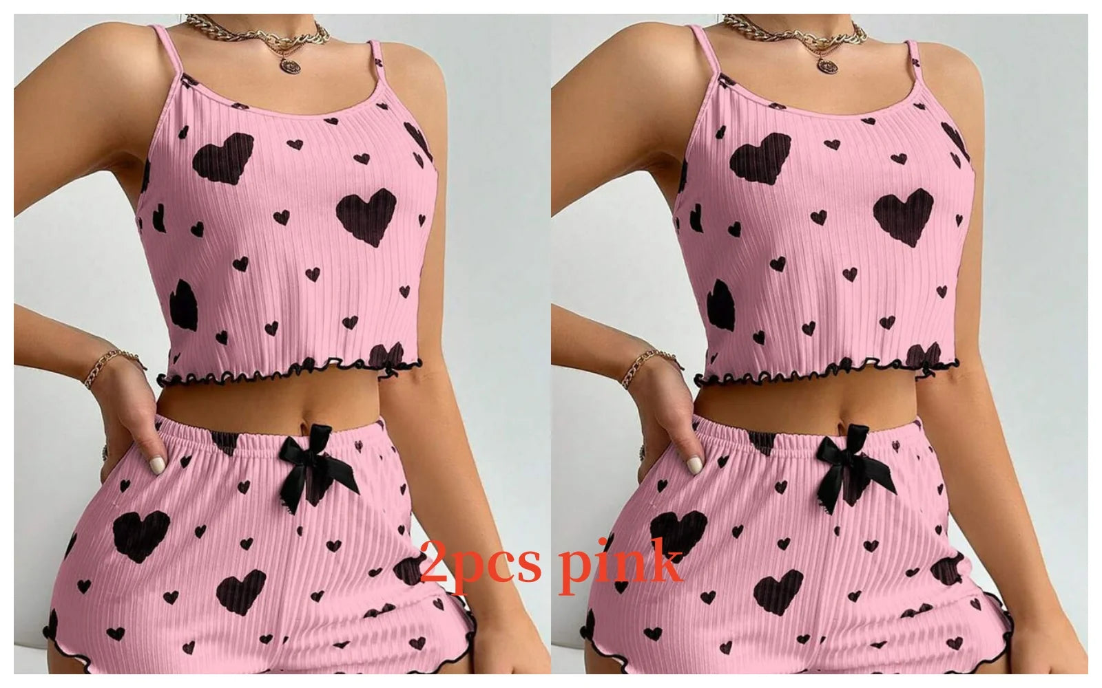 Two-piece pink Women's Pajamas Set - Soft Pajama Set with black hearts, perfect for stylish and comfortable sleepwear.