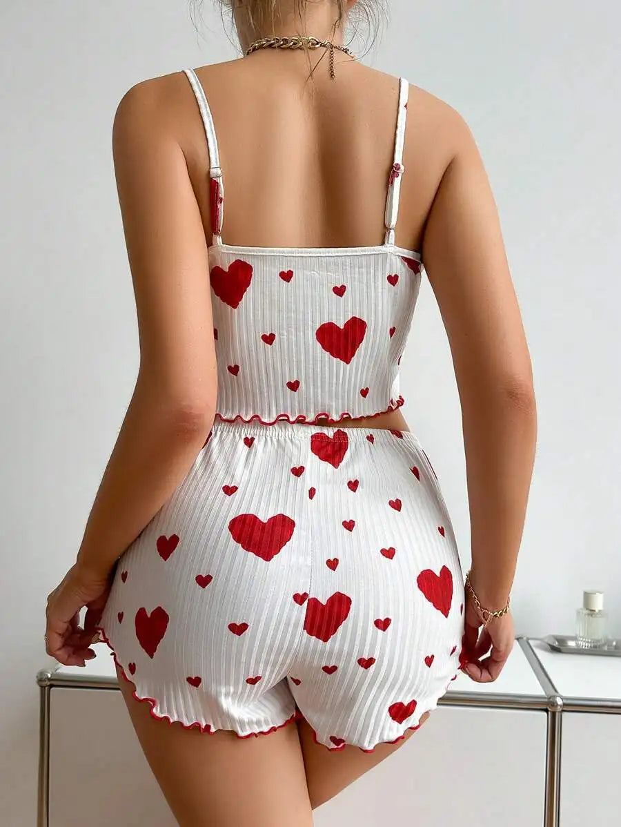Back view of white Women's Pajamas Set - Soft Pajama Set with red hearts, showing elastic waistband and relaxed fit for comfort.