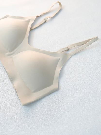 Flat lay of beige Seamless Underwear Bra Women - Soft Support, highlighting seamless construction and wireless design for invisible wear.