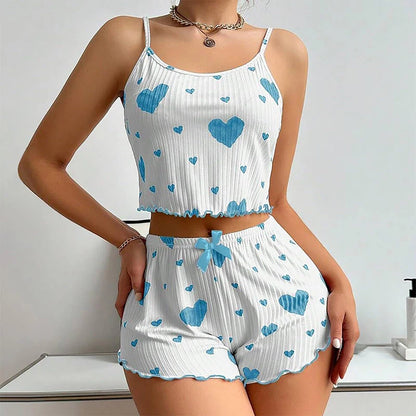 White Women's Pajamas Set - Soft Pajama Set with blue hearts, sleeveless top and shorts with bow detail for cozy relaxation.