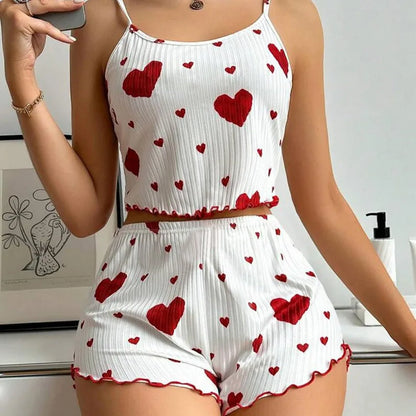 White Women's Pajamas Set - Soft Pajama Set with red hearts, sleeveless top and shorts perfect for lounging in comfort and style.